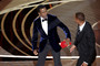Chris Rock and Will Smith onstage during the show at the 94th Academy Awards