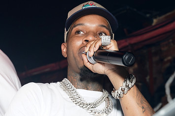 Tory Lanez with microphone in hand