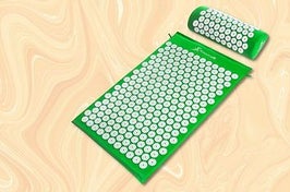 An acupuncturist explains how this scary-looking acupressure mat can help relieve back pain.