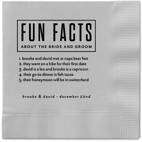 Napkin featuring five fun facts about the bride and groom, and the date of their wedding
