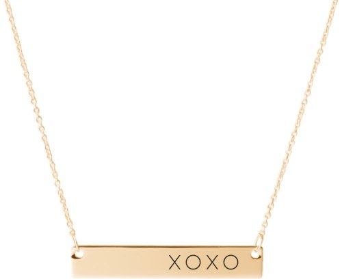 Gold bar necklace with &quot;x o x o&quot; written on it