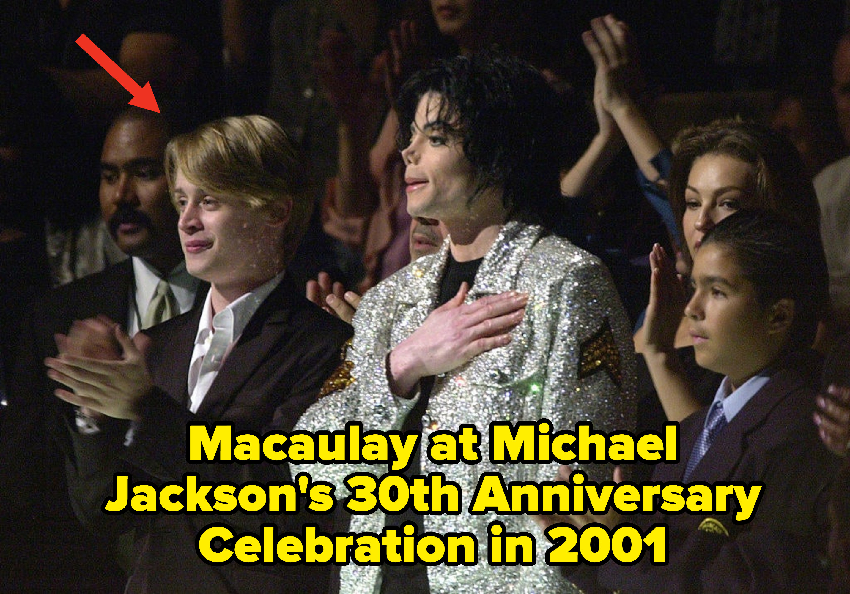 Macaulay standing next to Michael Jackson