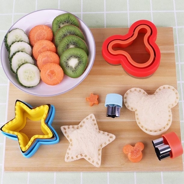 Sandwich cutters on display with fruit and sandwiches
