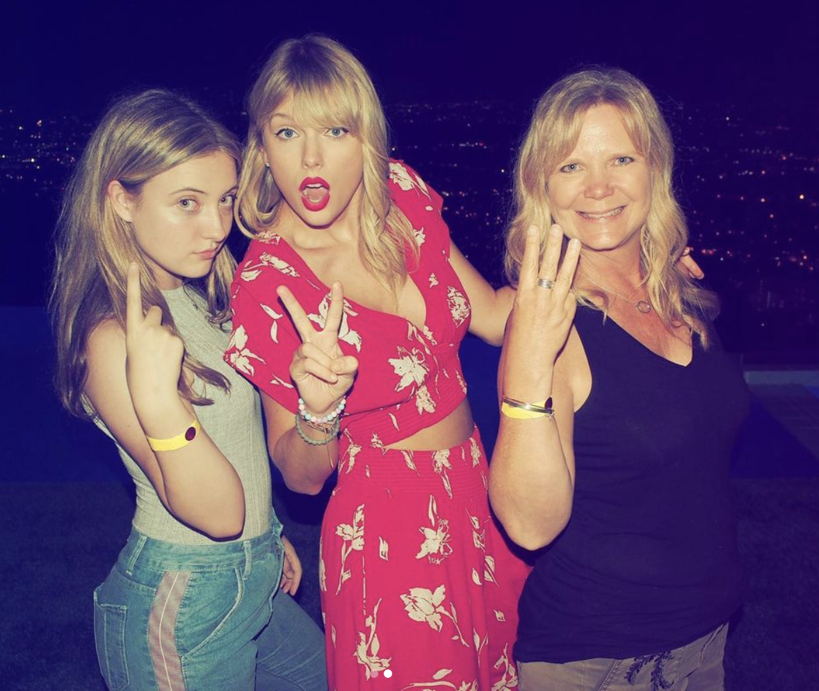 Emily Valencia and her mother with Taylor Swift