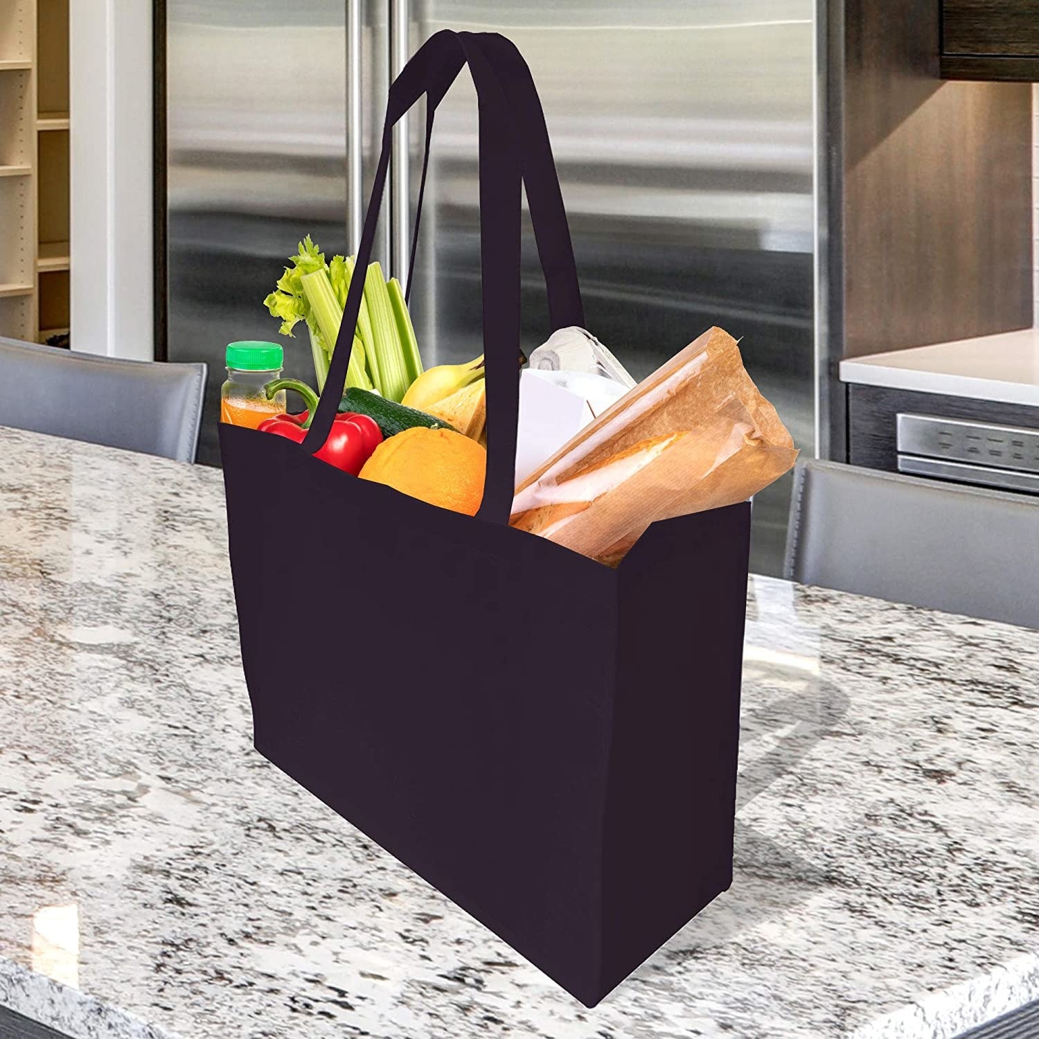 a grocery bag on a kitchen counter filled with food