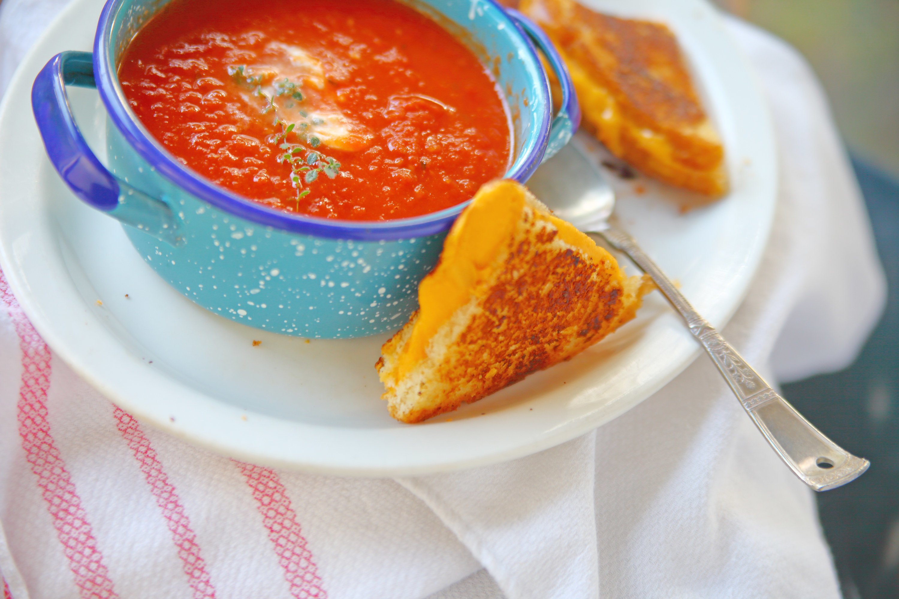 grilled cheese sandwich and a cup of tomato soup