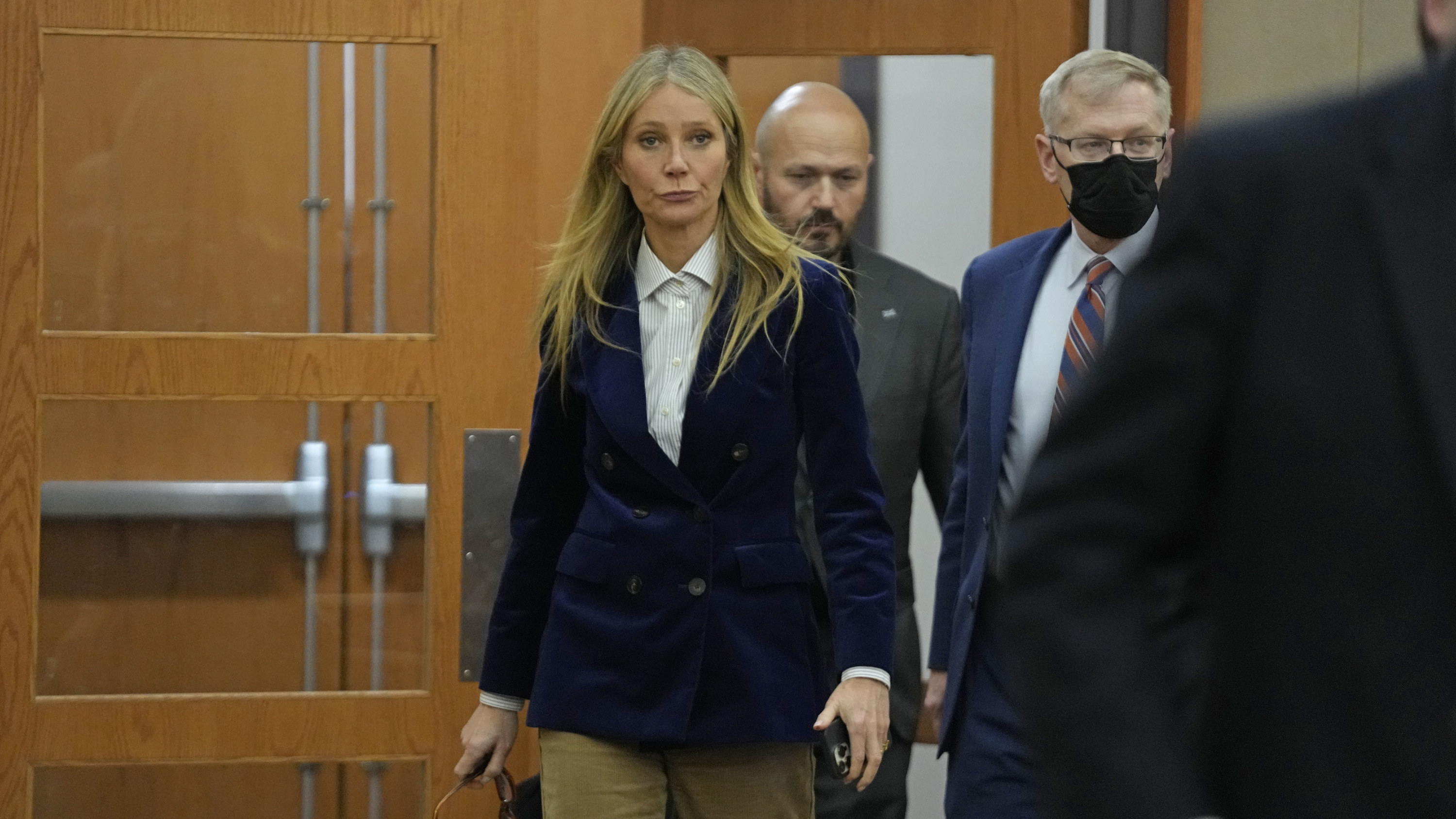 Gwyneth walking in the courtroom