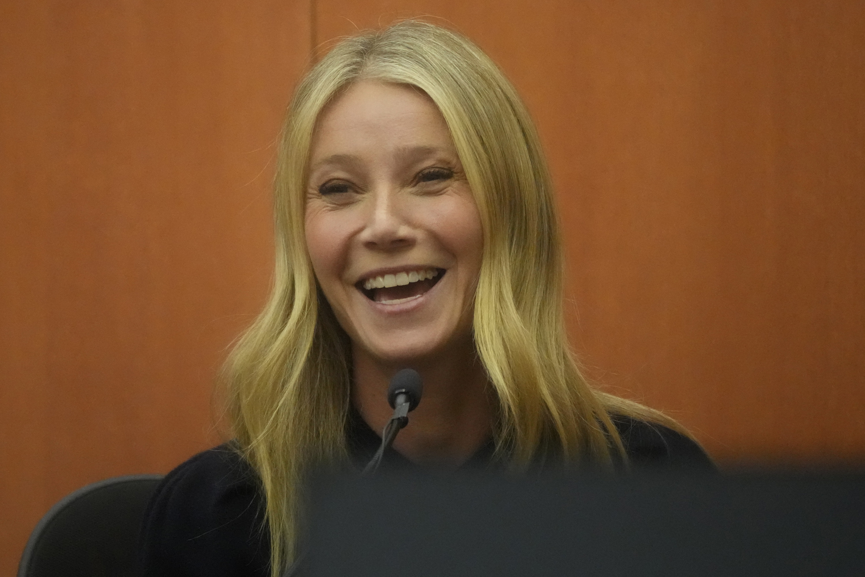 Gwyneth laughing in court