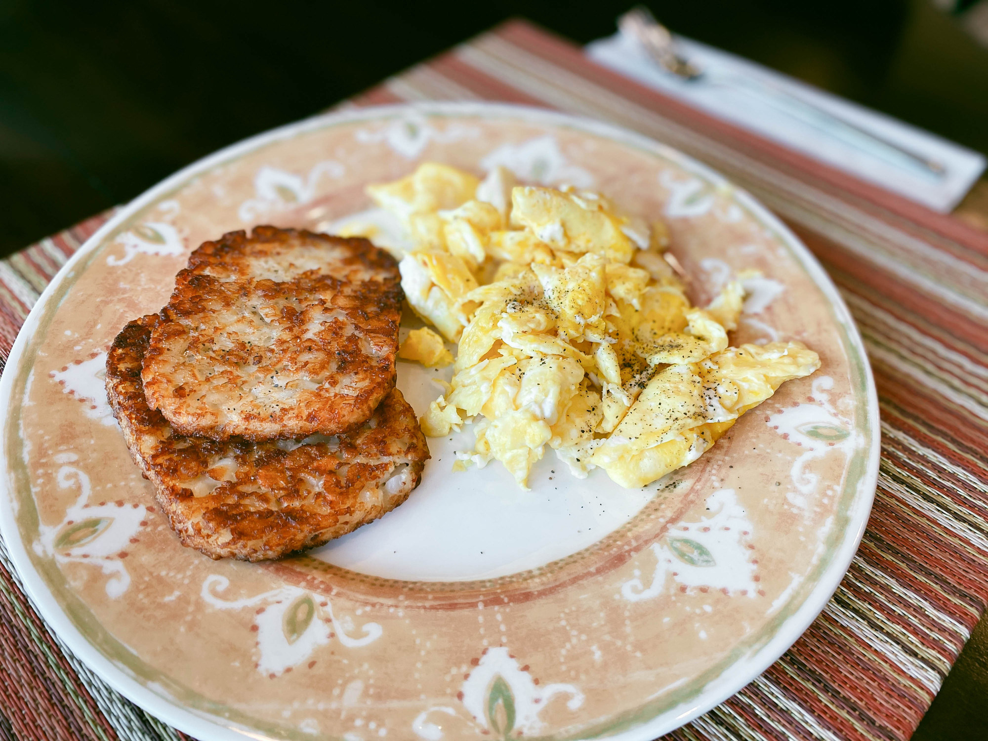 Hash browns and scrambled eggs.