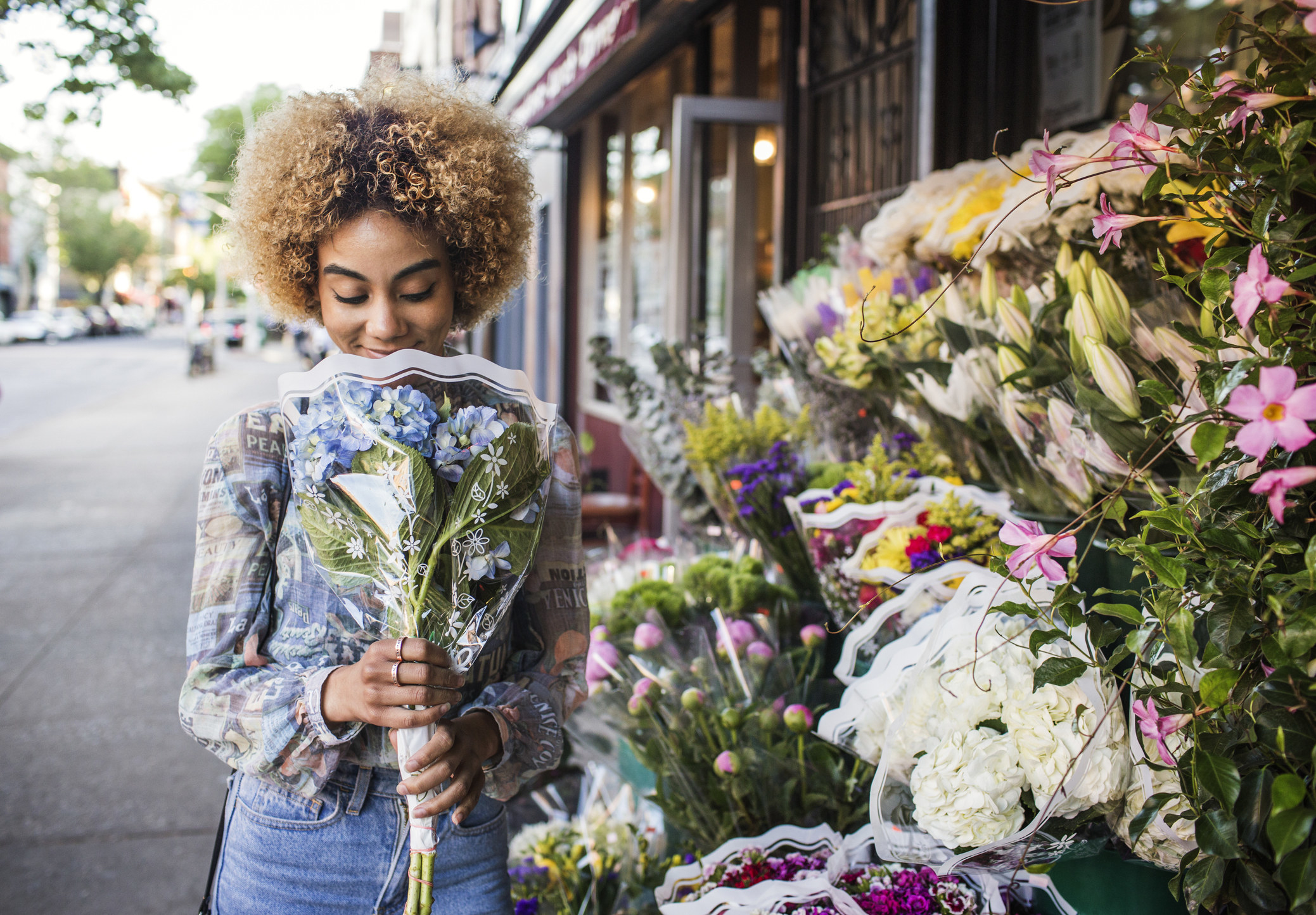 A woman holding a bouquet of flowers