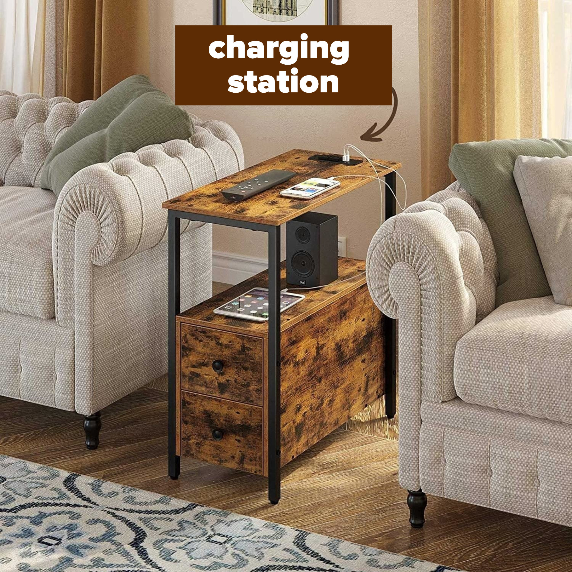 a narrow side table with two drawers and a charging station