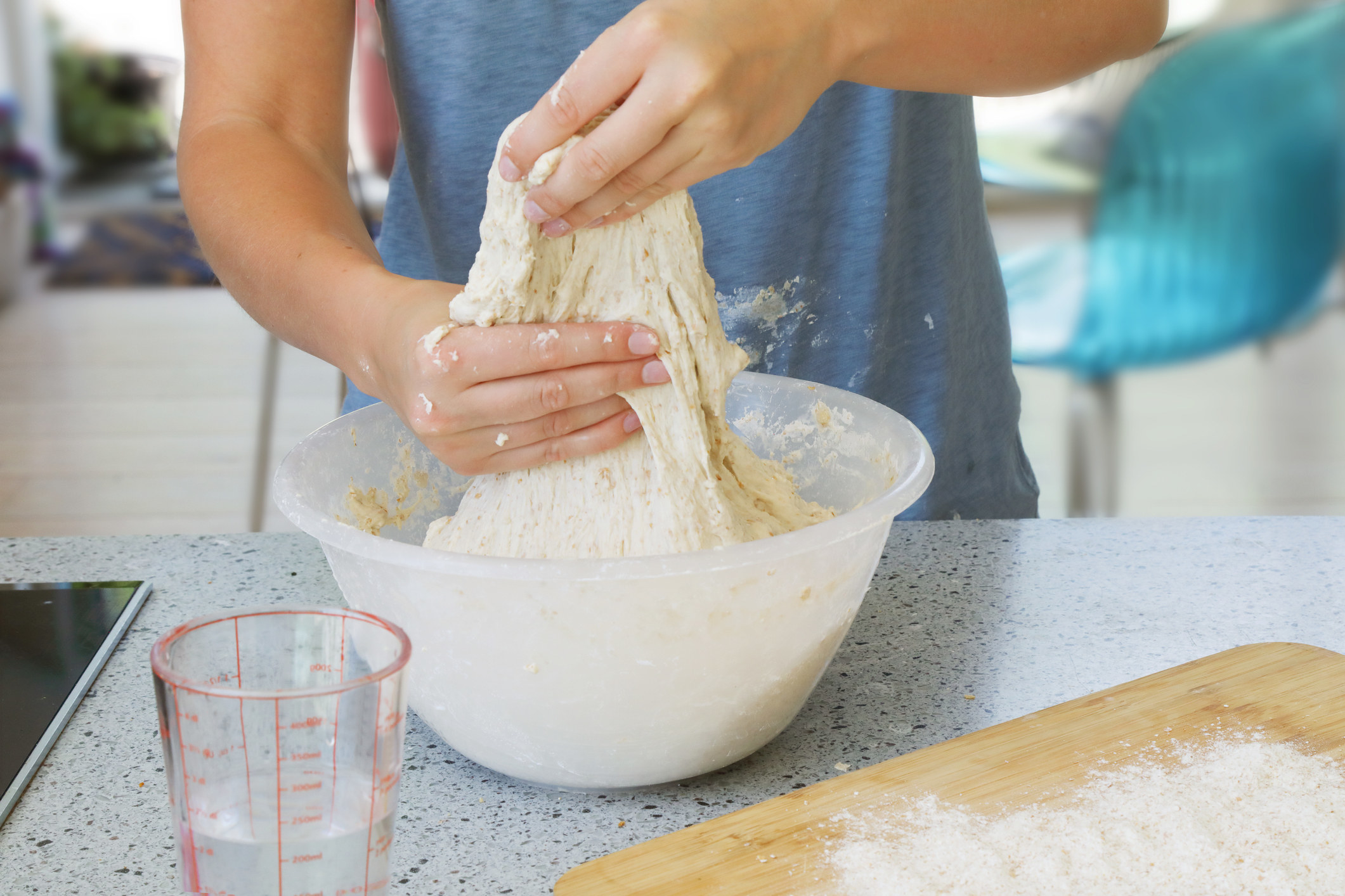 A woman making bread.