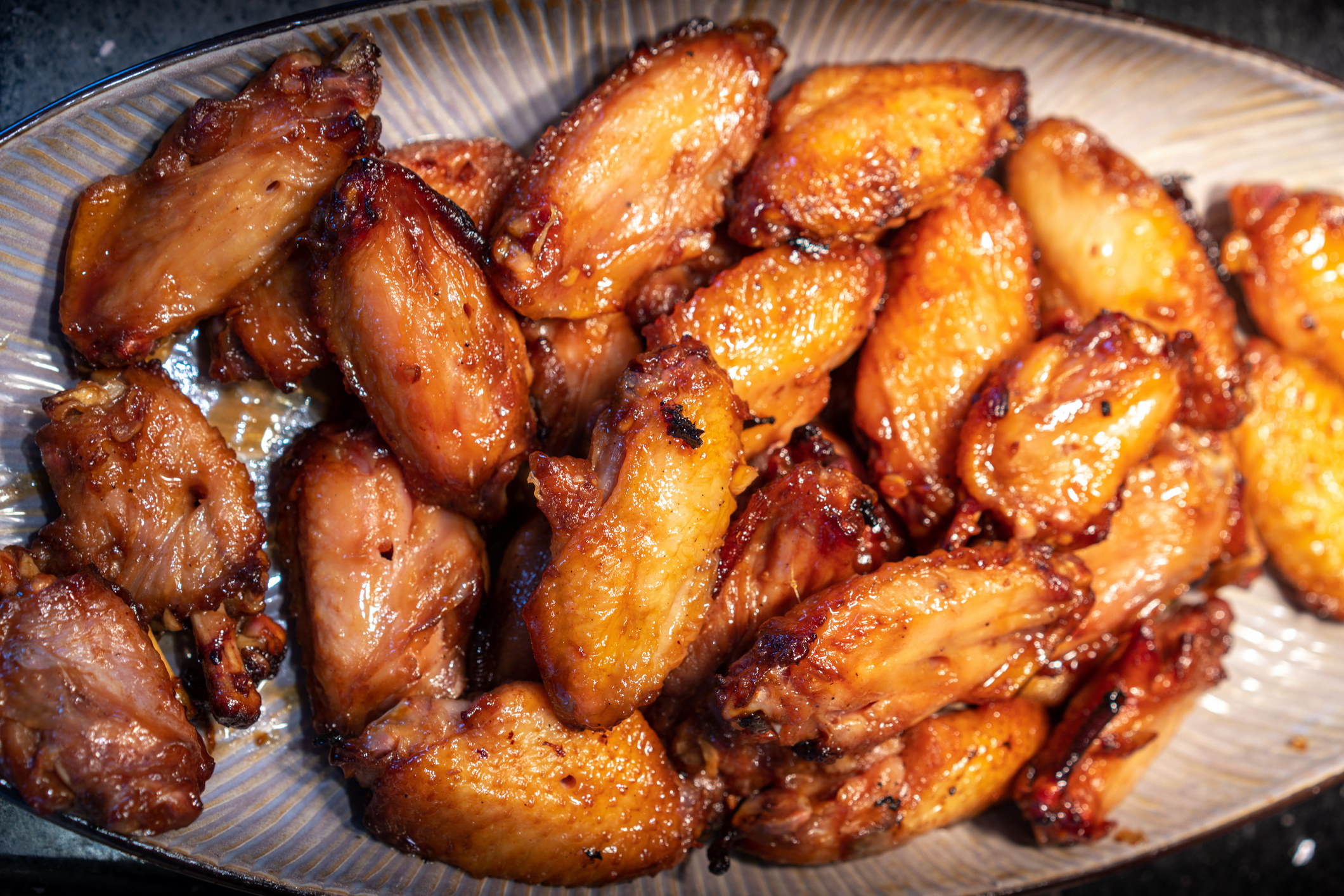 A platter of roasted chicken wings.