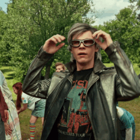 Evan Peters as Quicksilver in X-Men taking off his goggles and saying wow