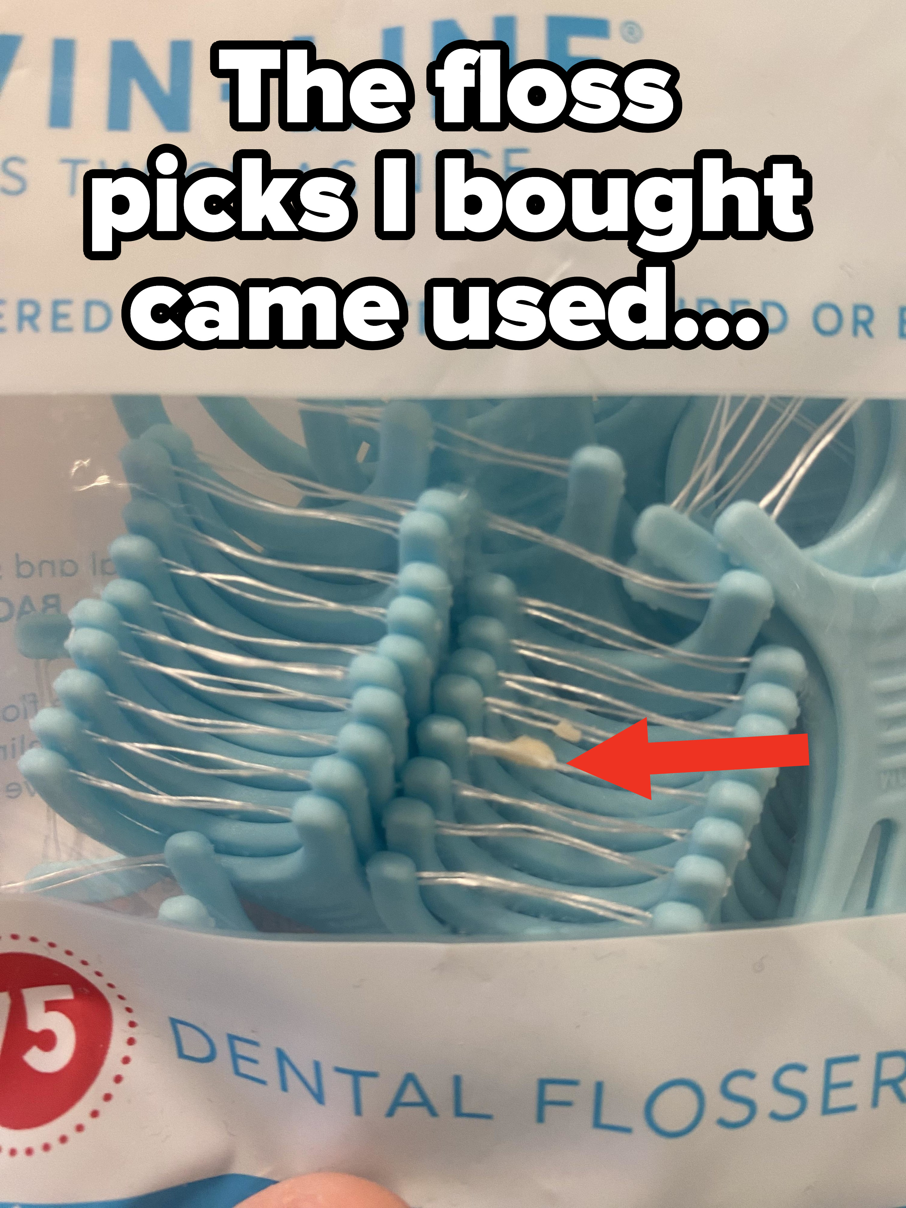 Dental floss with debris on it in the case