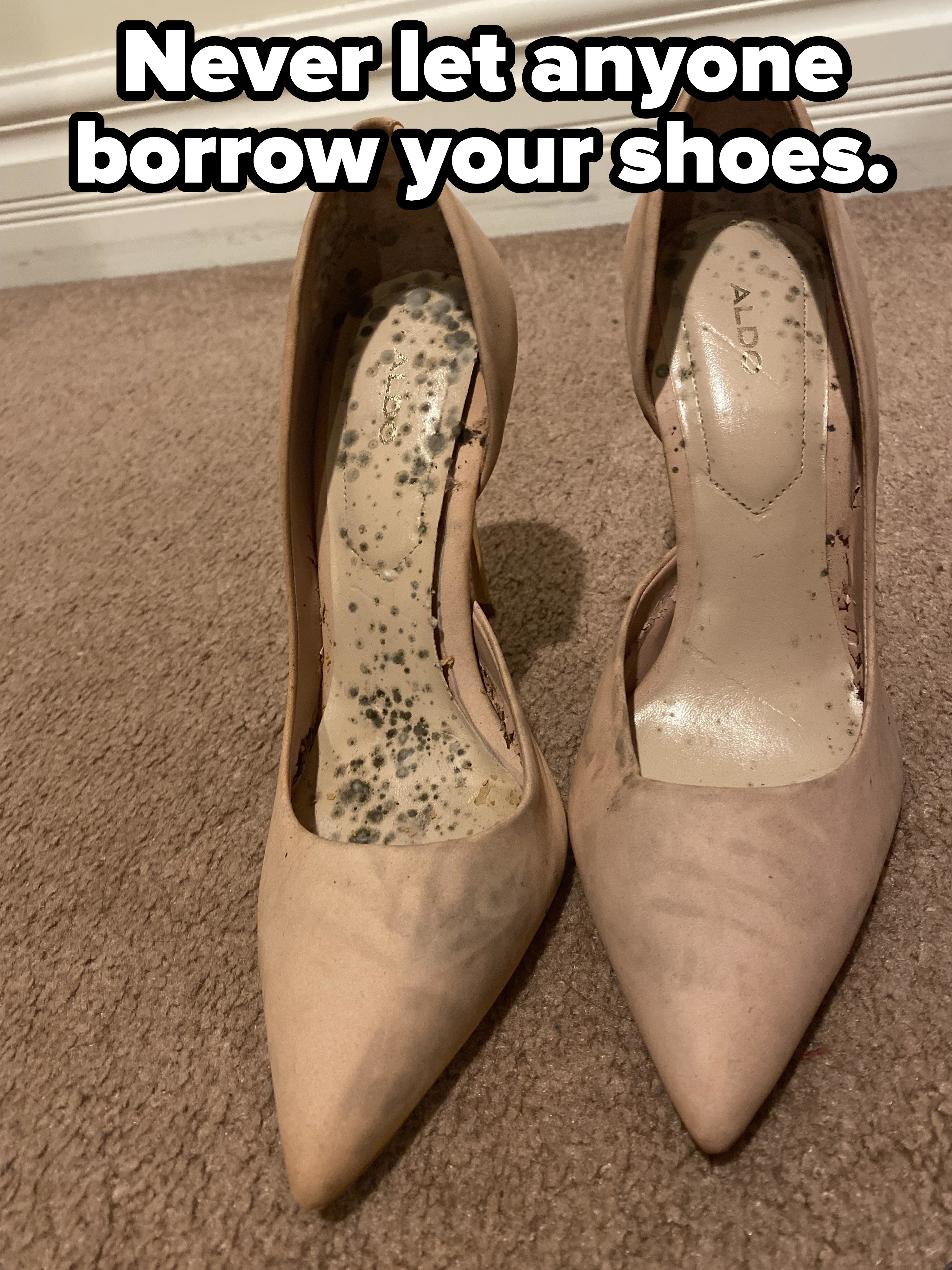 Mold/dirt stains inside a pair of high heels