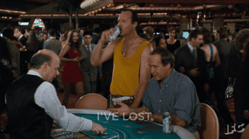 gif from vegas vacation with caption &quot;i&#x27;ve lost three hundred dollars in 15 minutes&quot;