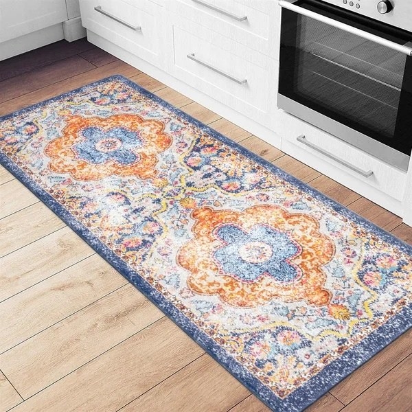 rectangle blue, orange, and yellow patterned anti-fatigue mat on kitchen floor