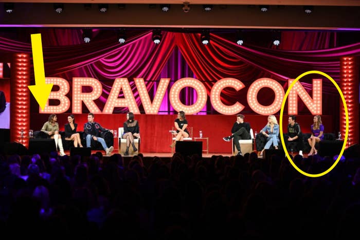 the cast sitting on stage for Bravocon with a circle around ariana and tom at one end and an arrow pointing to raquel sitting at the other end