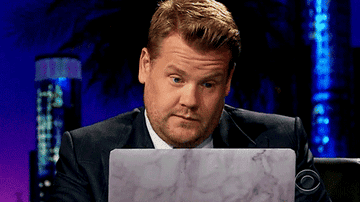 James Corden makes a face as if to say, &quot;not bad,&quot; while reading from his laptop on  &quot;The Late Late Show&quot;