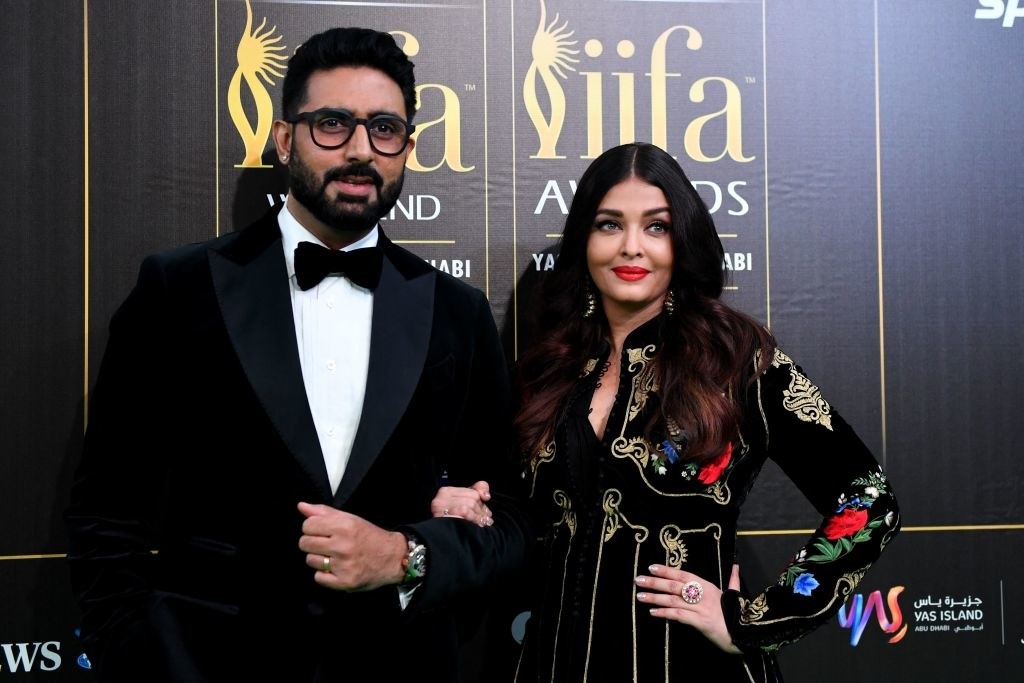 Bollywood actors, Abhishek Bachchan (L) with wife Aishwarya Rai Bachchan arrive for the green carpet of 22nd edition of the International Indian Film Academy (IIFA) Awards