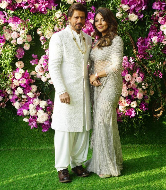 Bollywood actor Shah Rukh Khan with his wife Gauri Khan attending the wedding ceremony of Akash Ambani