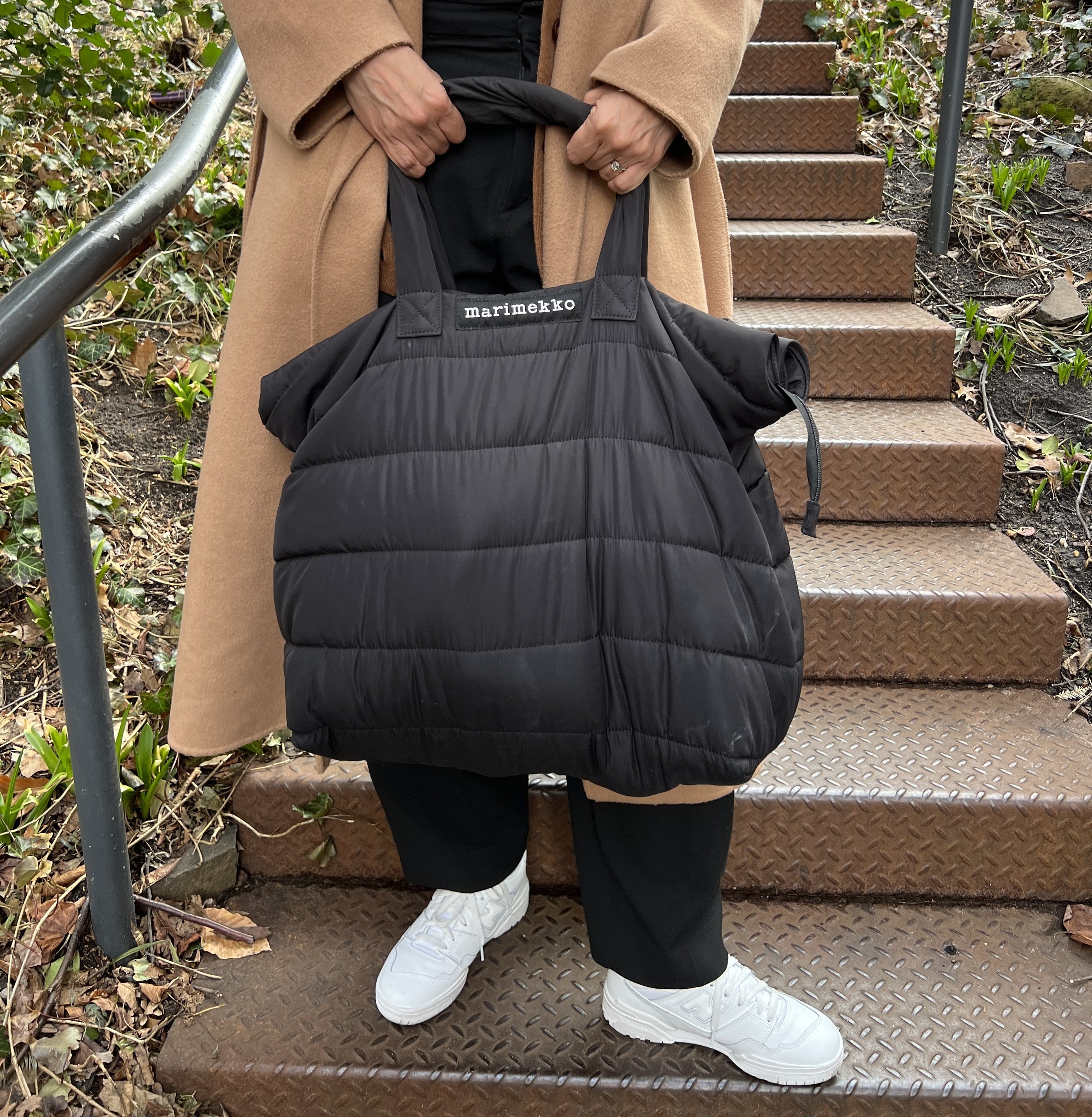 Soft black carry all bag with white Marimekko logo