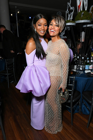 Angela Bassett and Ariana DeBose attend the EE BAFTA Film Awards 2023 Dinner at the Royal Festival Hall on February 19, 2023 in London, England