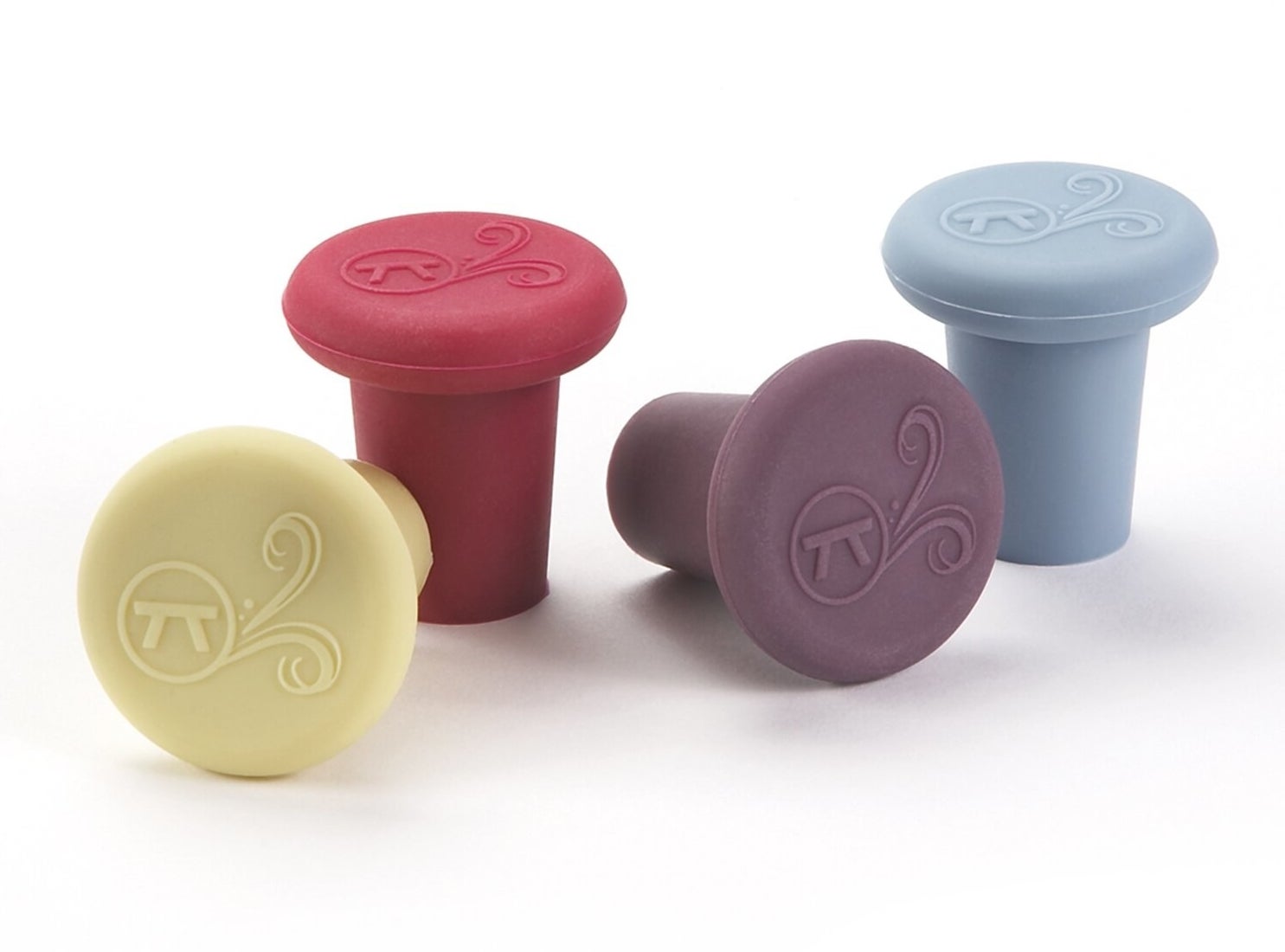 Image of four yellow, red, purple, and blue wine corks