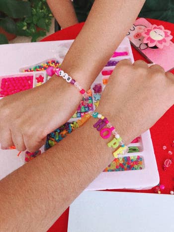 Reviewer's photograph of bracelets connected wrists
