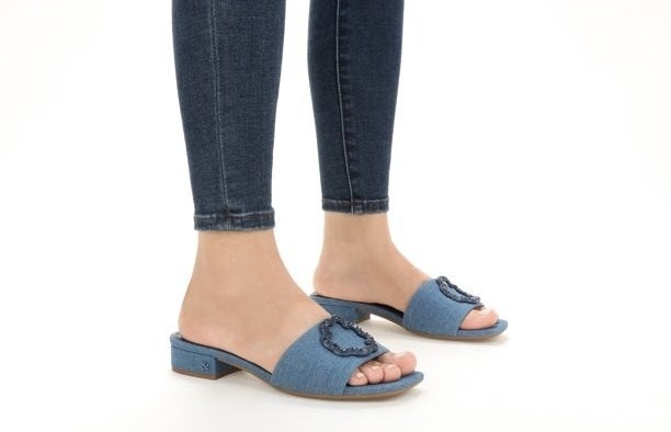 model wearing the denim sandals