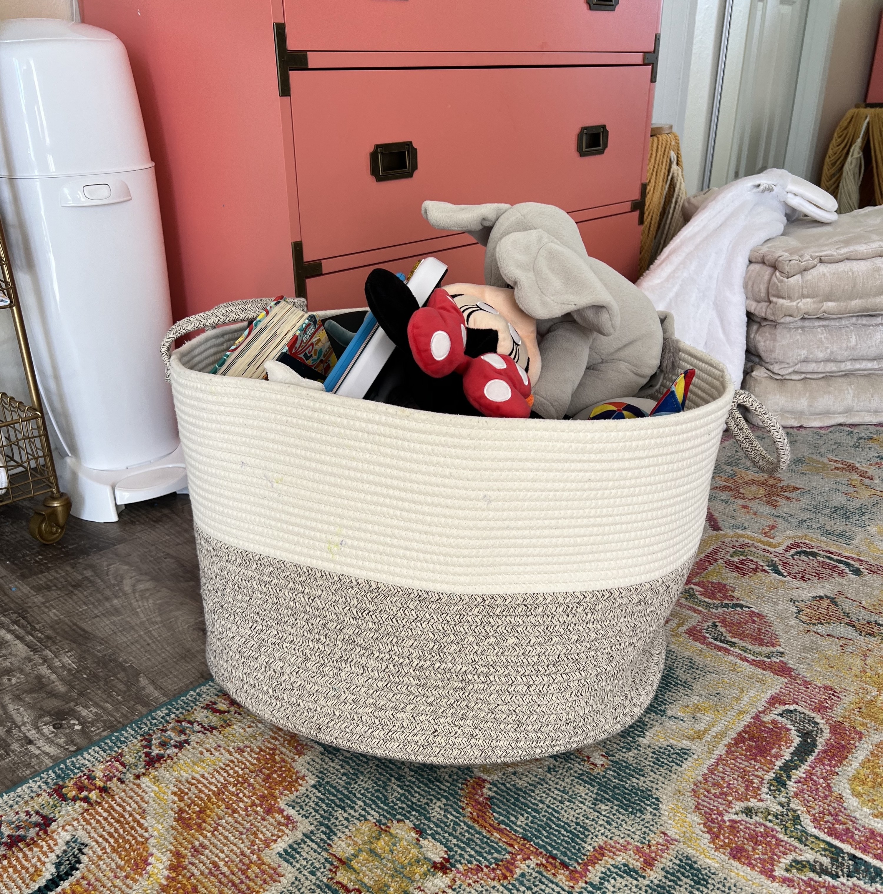 A woven basket with toys in it