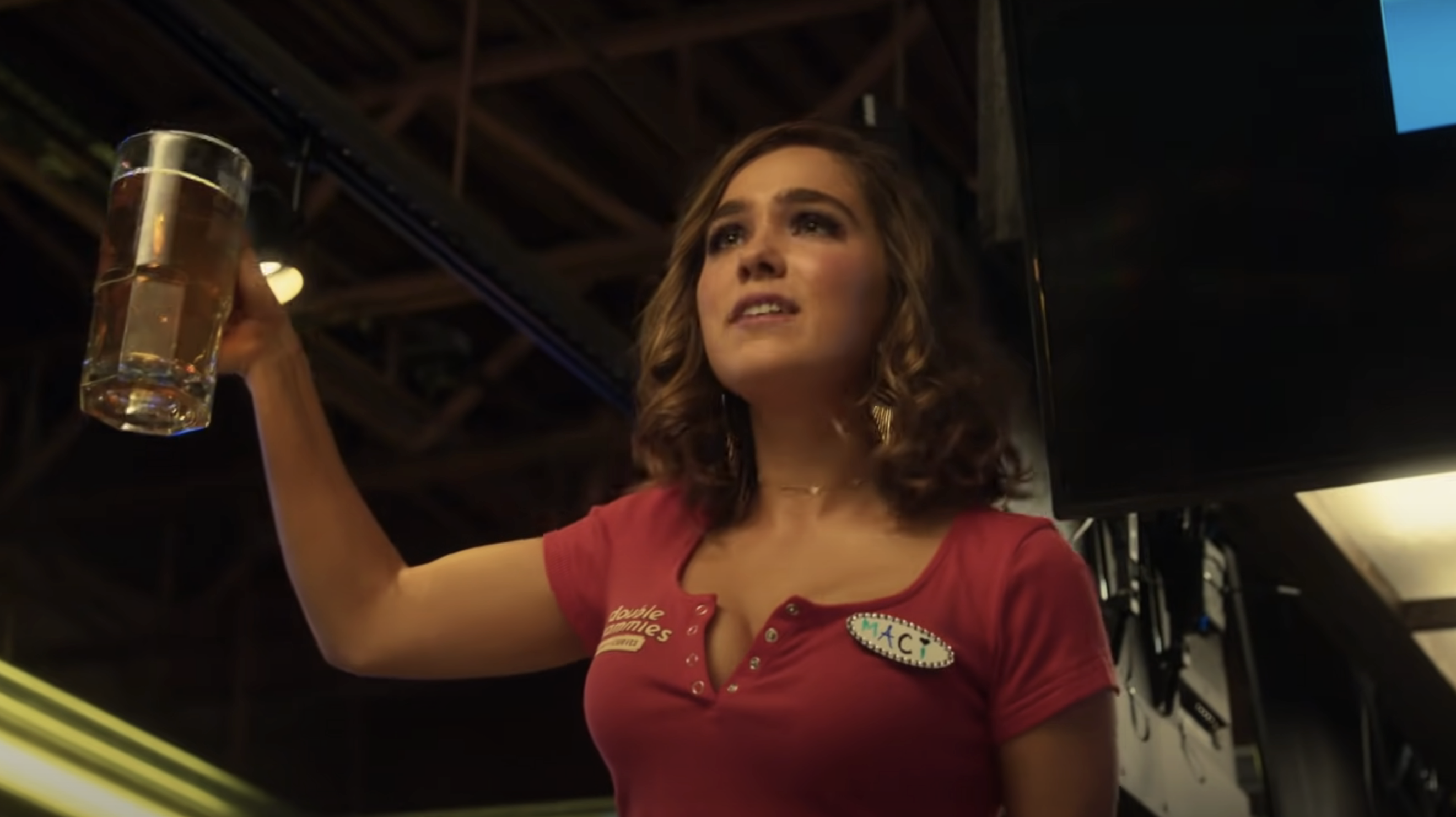 Haley Lu Richardson holding a beer in &quot;Support the Girls&quot;