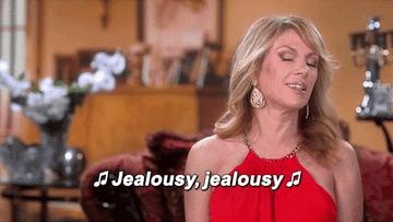 Gif of Ramona Singer from &quot;The Real Housewives of New York&quot; singing &quot;jealousy, jealousy&quot;