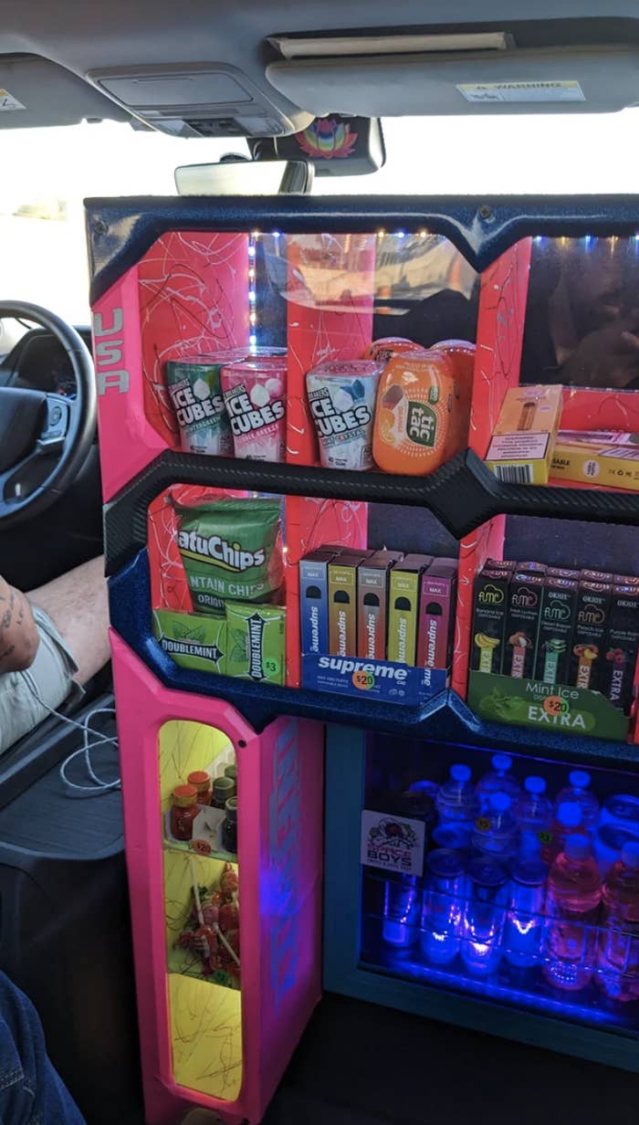 gum, snacks, and drinks for sale in the car
