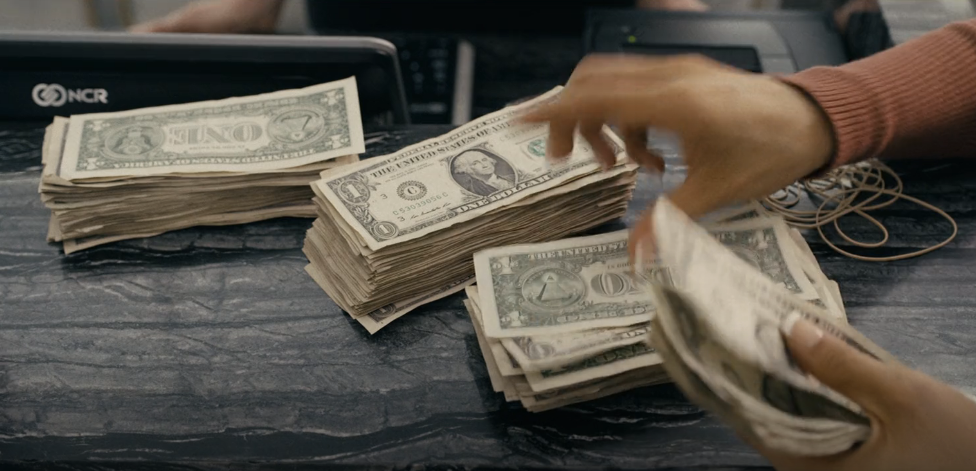 Jennifer Lopez&#x27;s character counting her money from working in &quot;Hustlers&quot;