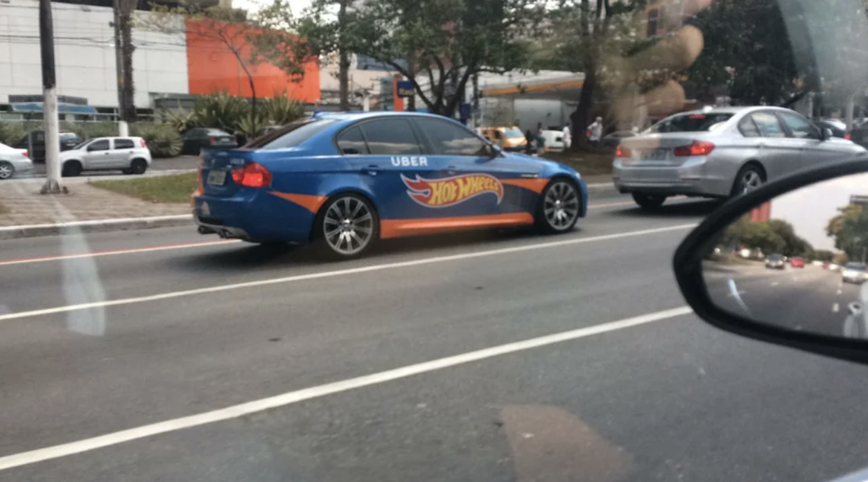 uber car with the hot wheels logo along the side