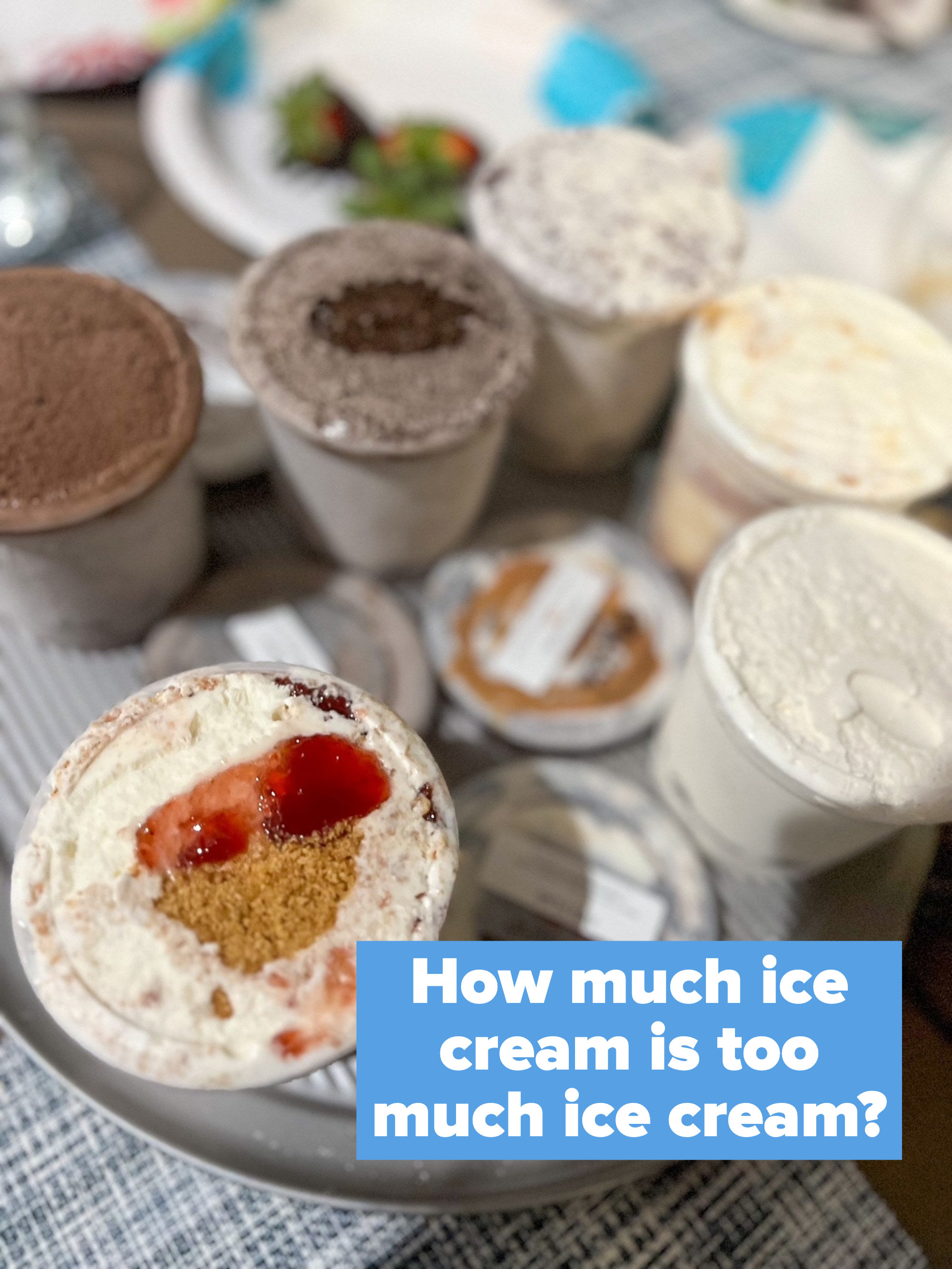 Pints of ice cream on a table.