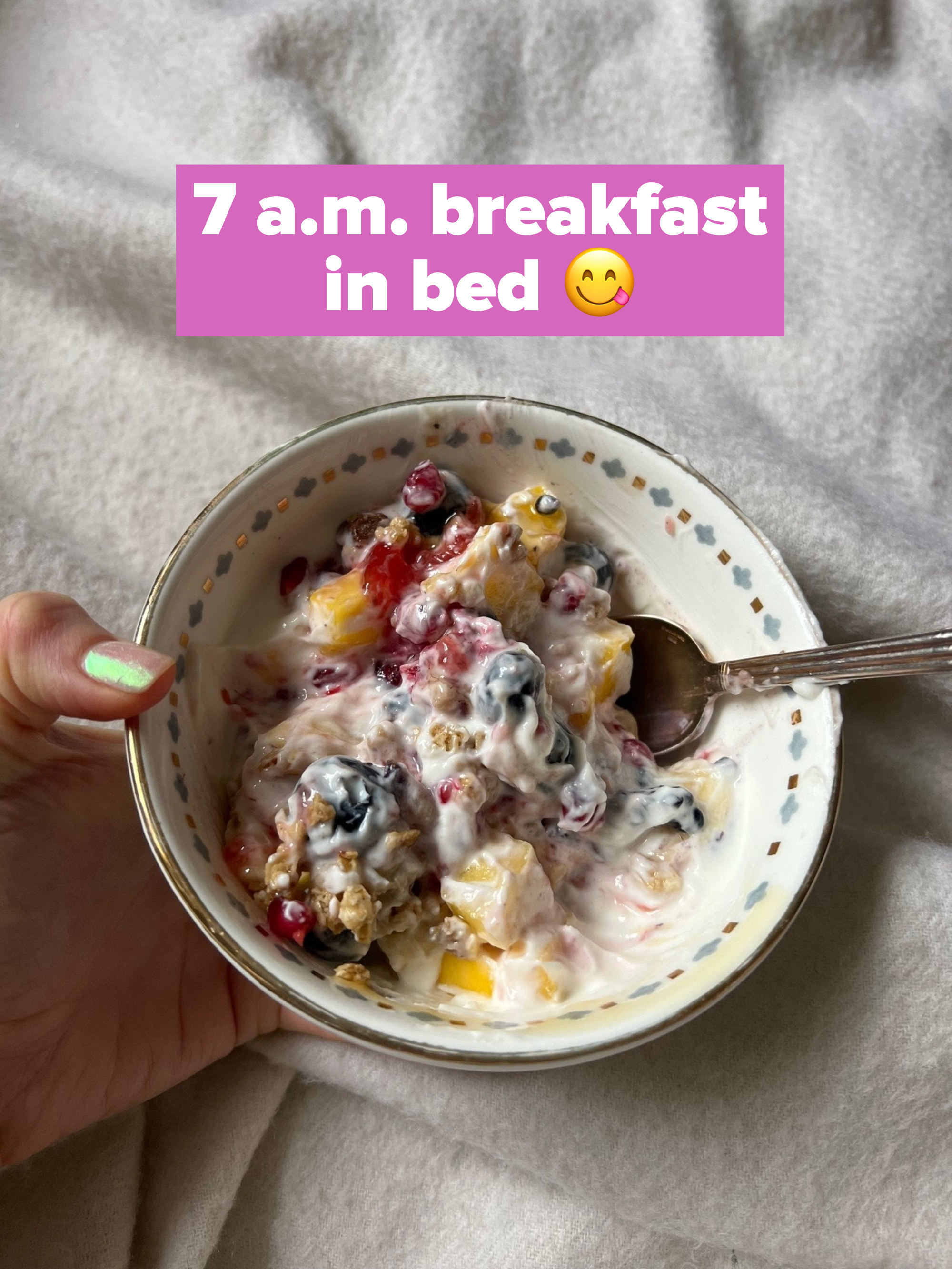 A bowl of yogurt on a blanket.