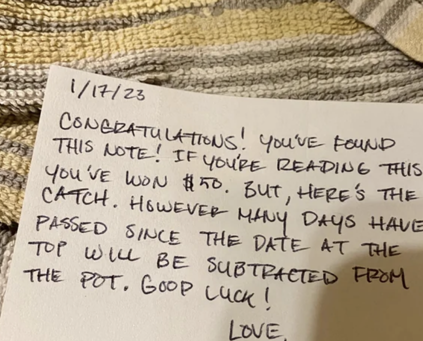 A handwritten note from Mom and Dad dated 1/17 and saying the kids have won $50 for finding it, but the number of days that have passed since that date will be subtracted from the prize