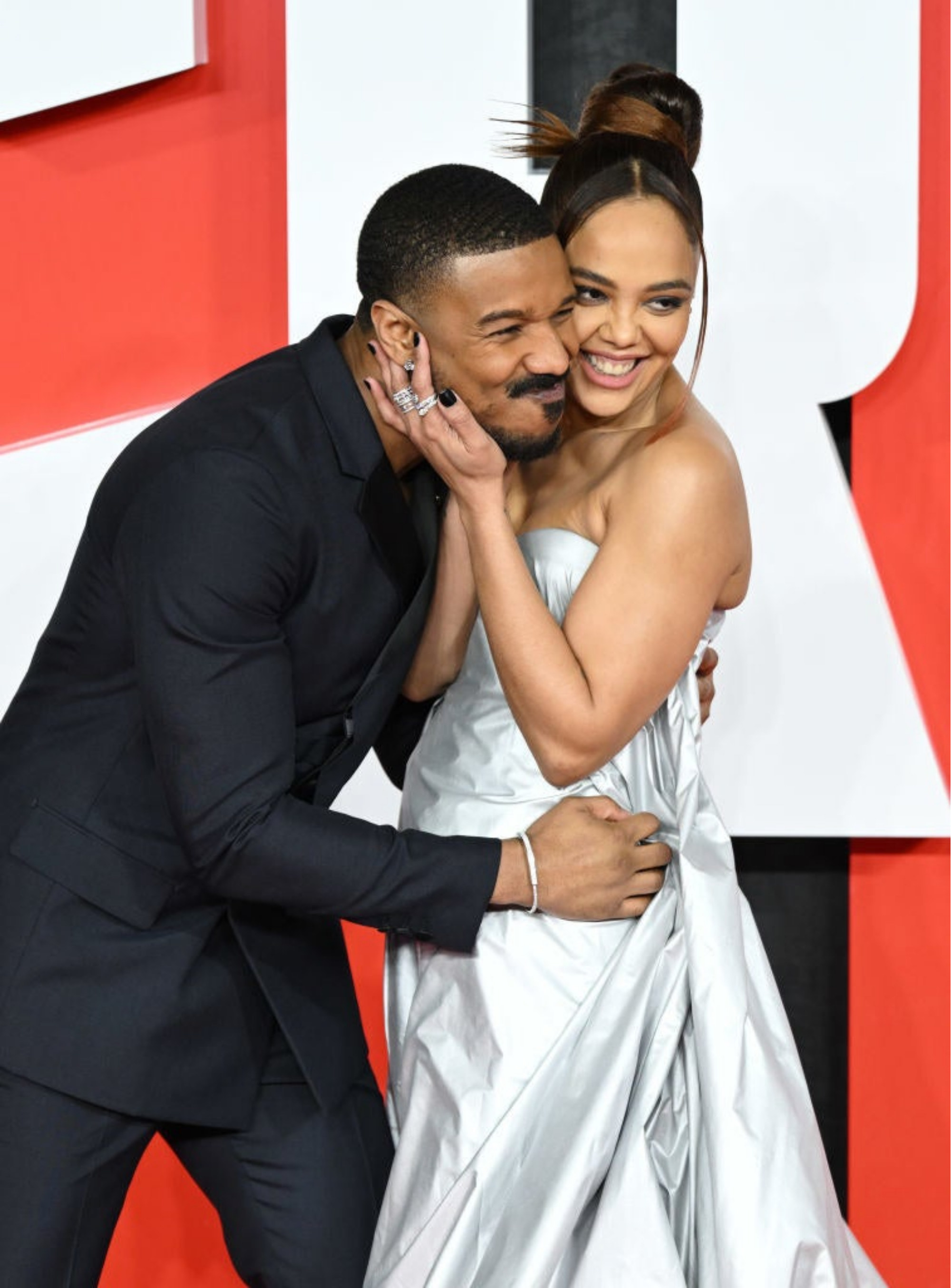 Michael hugging Tessa on the red carpet