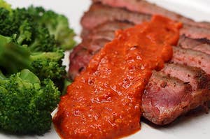 Spicy Flank Steak With Red Pepper Romesco Sauce and broccoli