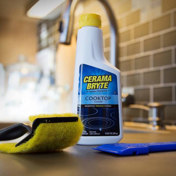 the stovetop cleaning product with the two scrubbing tools