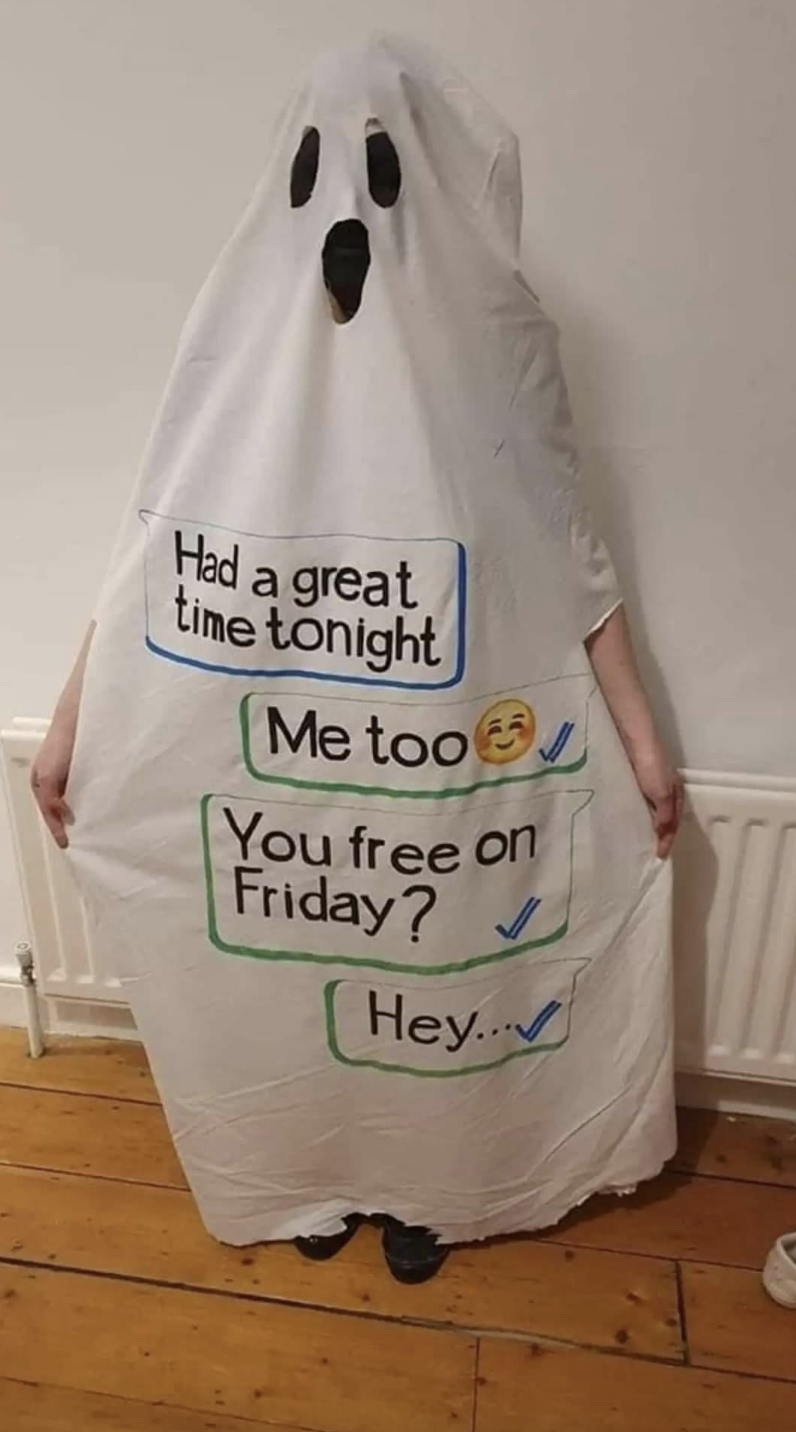 A ghost costume with &quot;Had a great time tonight,&quot; &quot;Me too,&quot; &quot;You free on Friday?&quot; and &quot;Hey&quot; bubbles written on it