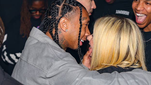 A series of photos show the rapper and singer/songwriter kissing during Fashion Week. Rumors have been swirling about a relationship since February.