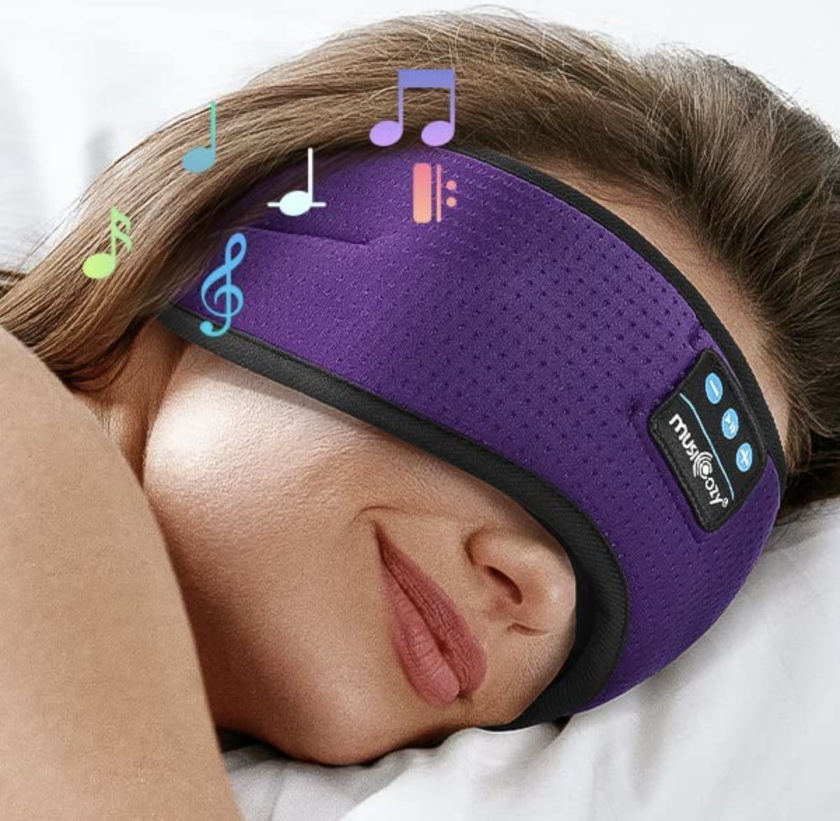 a person sleeping with the mask over their eyes