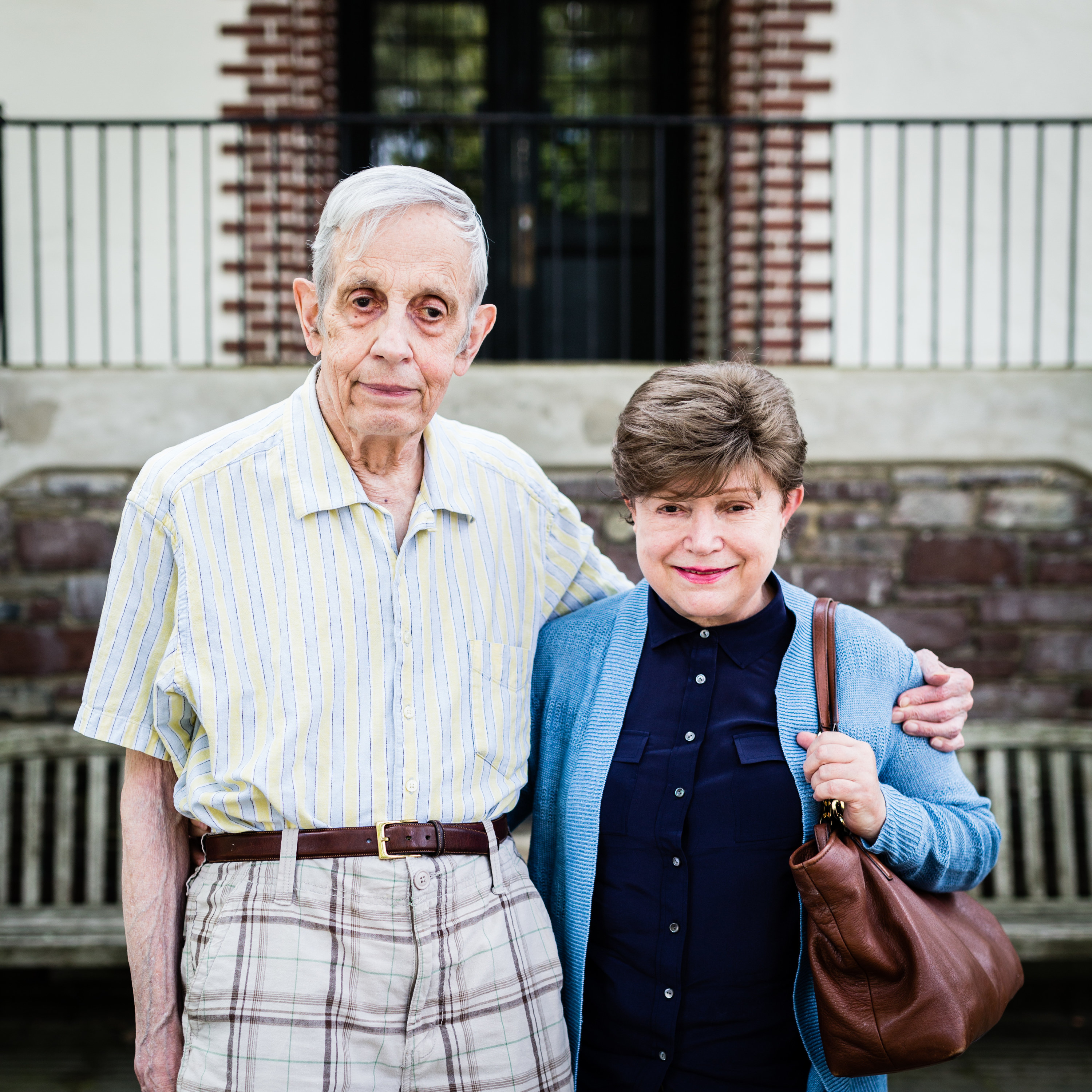John Nash and wife Alicia Nash pose for a photo on August 9, 2014, in Princeton, New Jersey