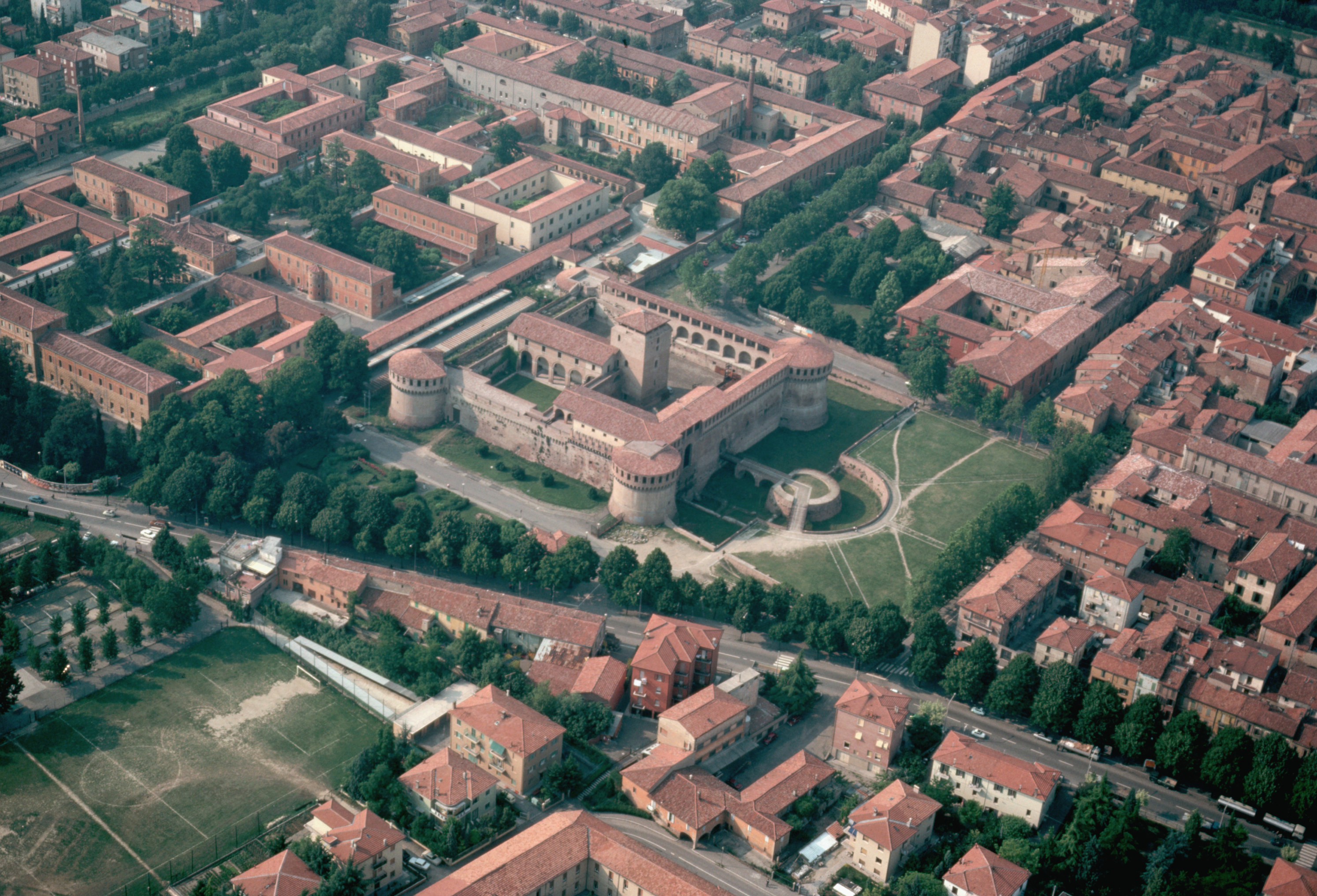 aerial view of Imola, Italy which has lots of buildings in square formations