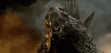 Godzilla roaring amidst the darkness