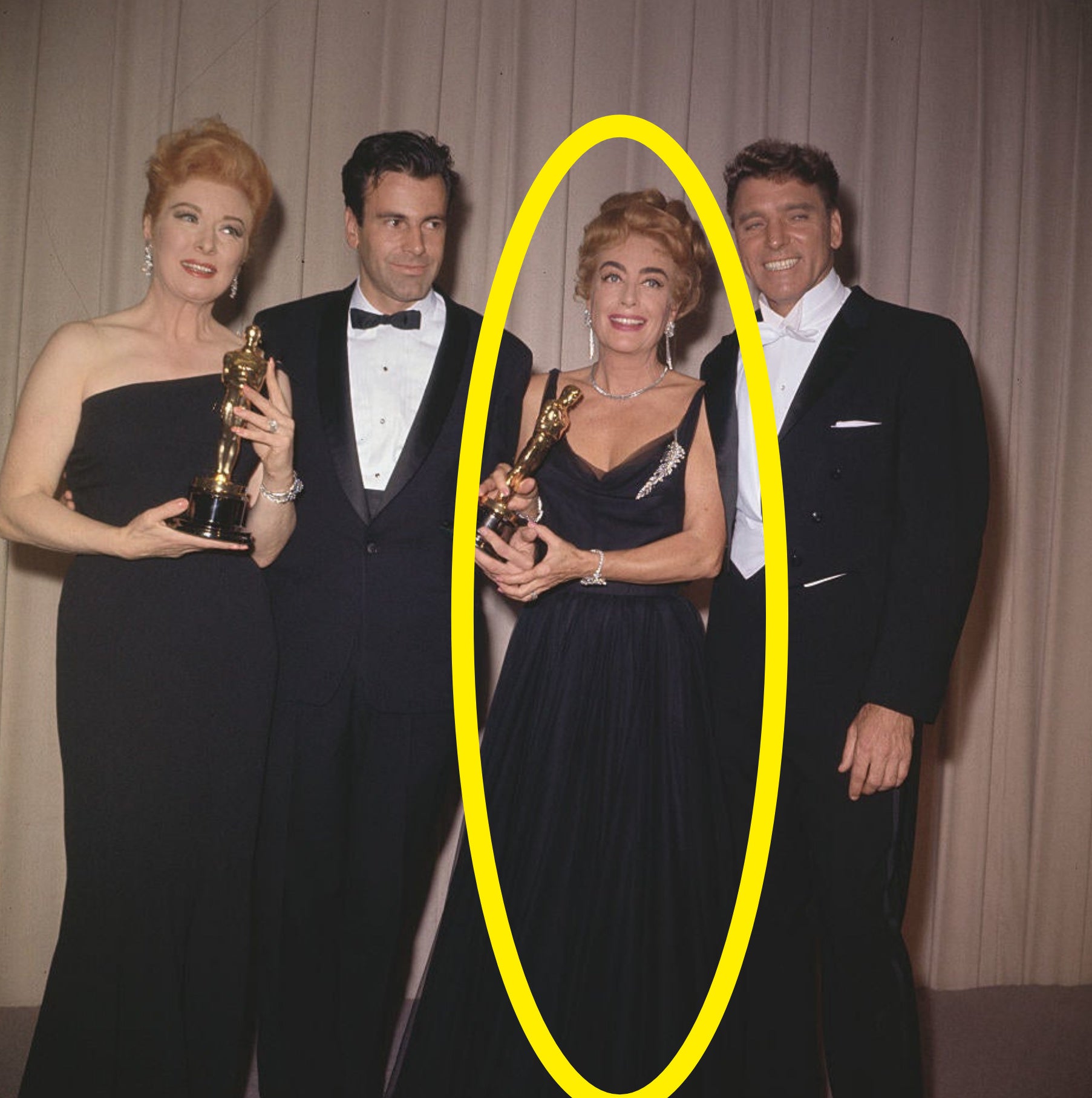 Joan with the award for Anne Bancroft posing with Anne&#x27;s costars